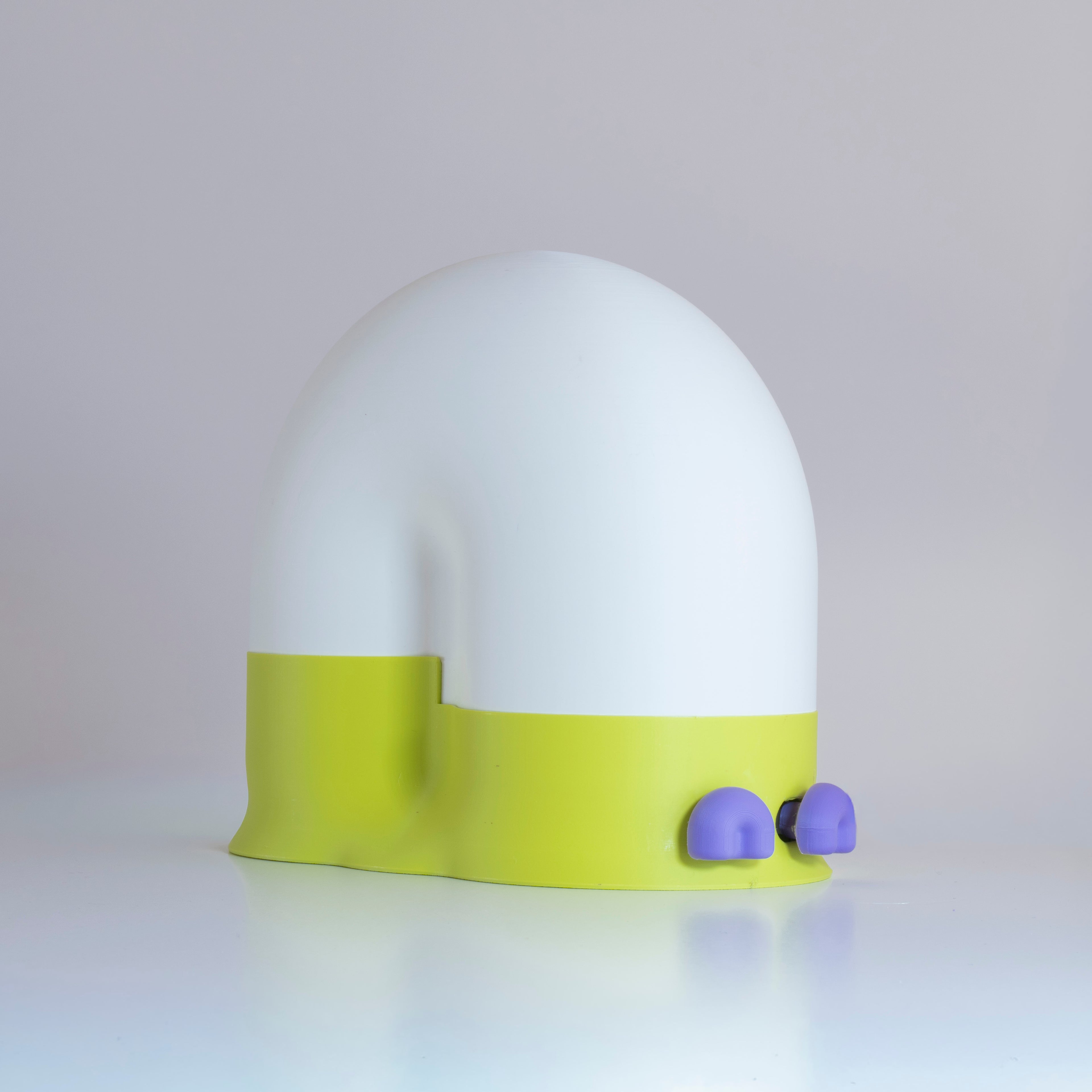 White snail-shaped lamp with a lime green base and lavender purple eyes on a light gray background
