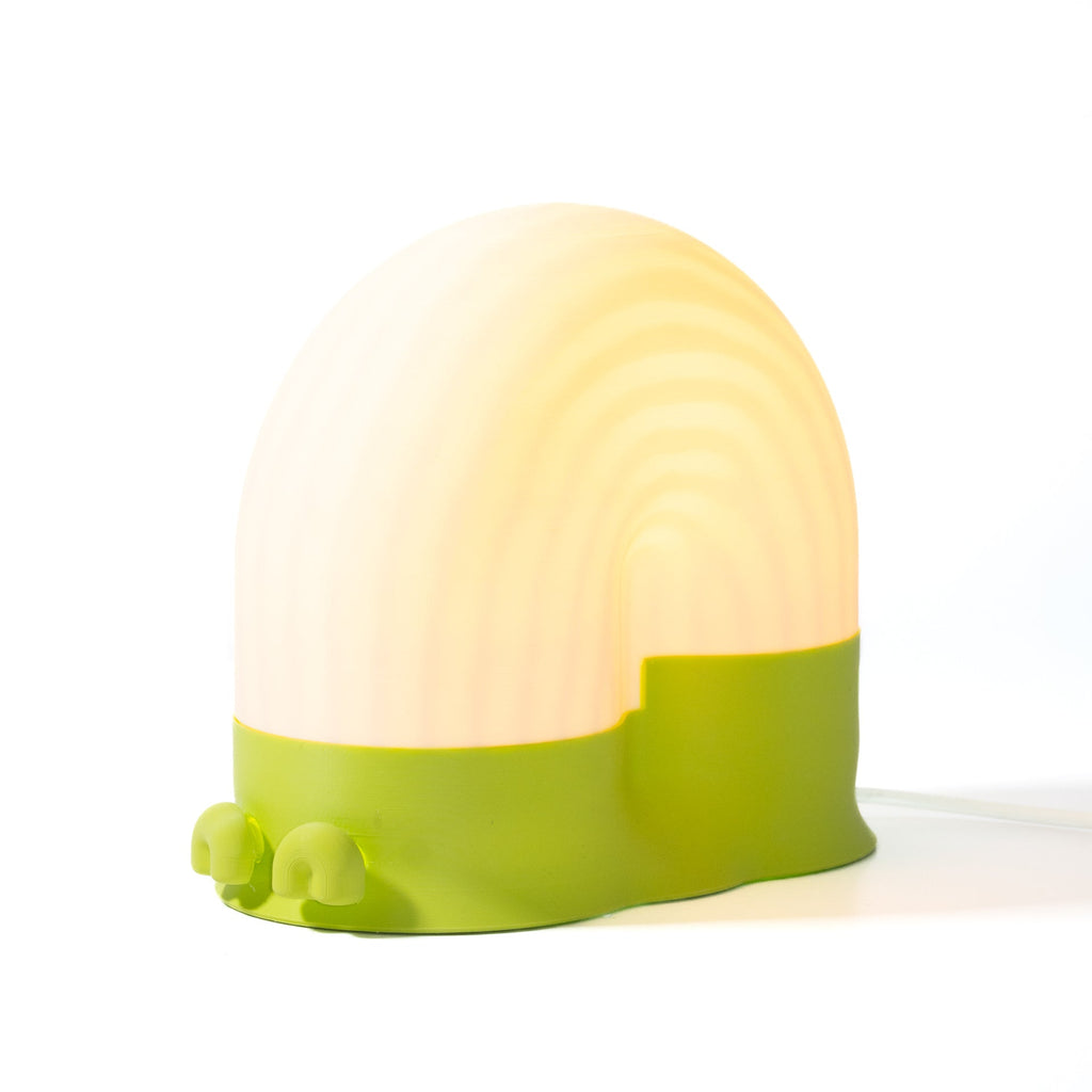 Green and white lamp on a white background