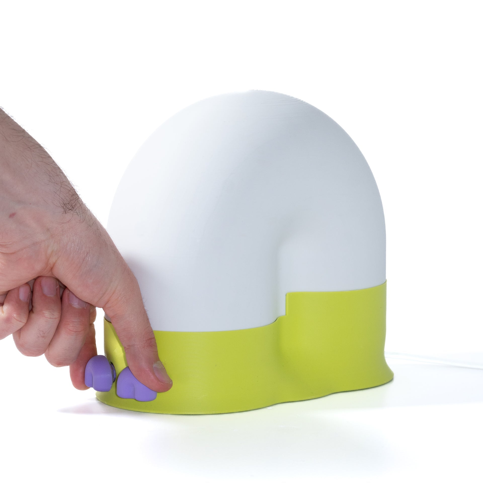 White and green container with a purple handle on a white background