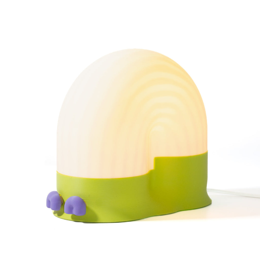 Light bulb-shaped object with a green base on a white background