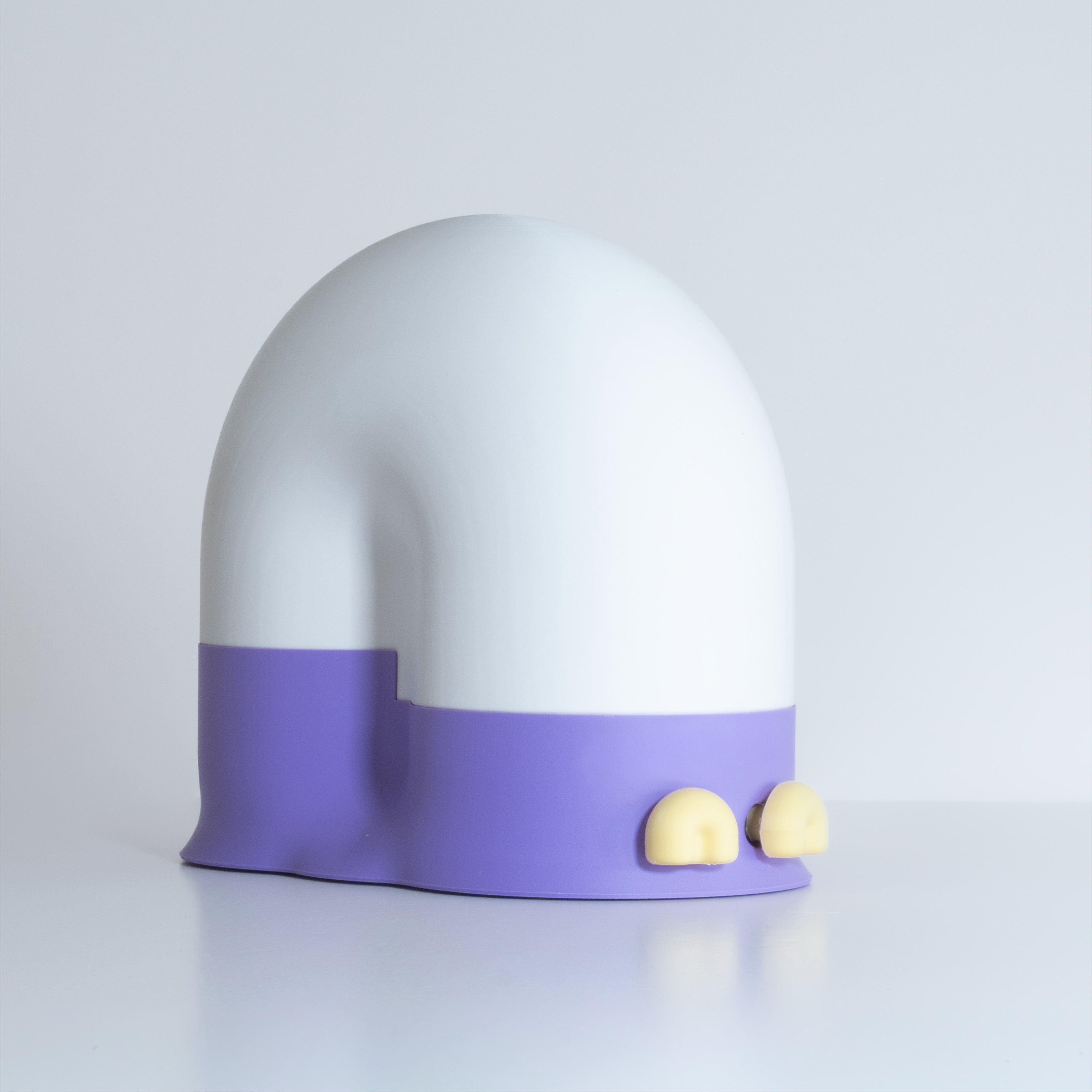 White snail-shaped lamp with a lavender base and yellow eyes on a light gray background