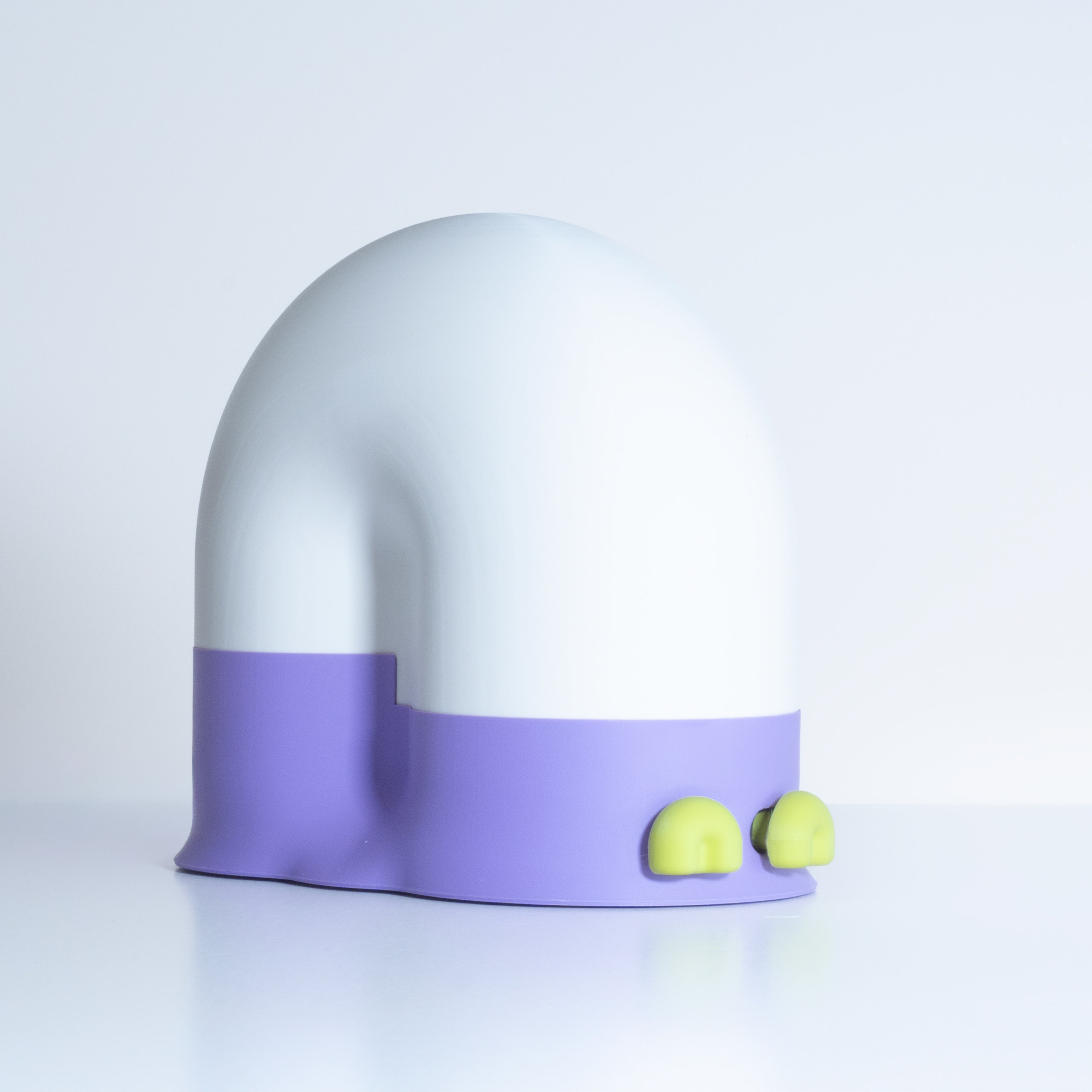White snail-shaped lamp with a lavender base and lime green eyes on a light gray background