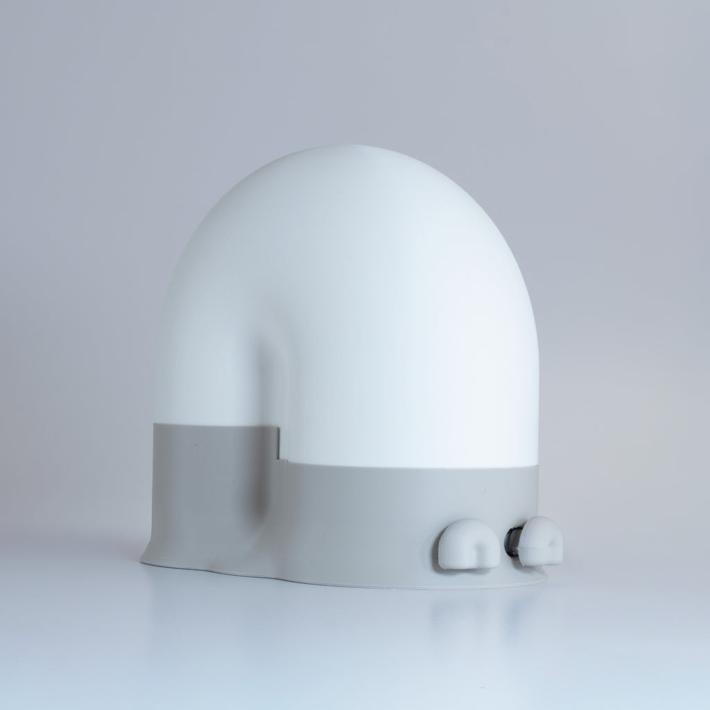 White snail-shaped lamp with a gray base and gray eyes on a light gray background